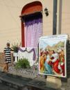 In Flores, Easter celebration preparations: The bus pickup was next to this home with a stations of the cross display.